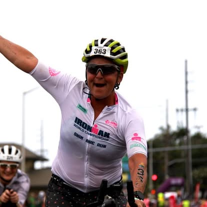 Jacque Muñiz Groenendyk celebrating on the bike leg of the Ironman World Championship